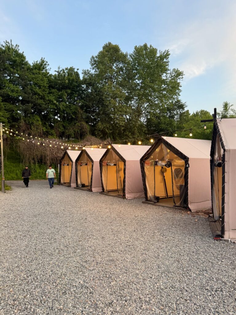 Tents facing the sandpit