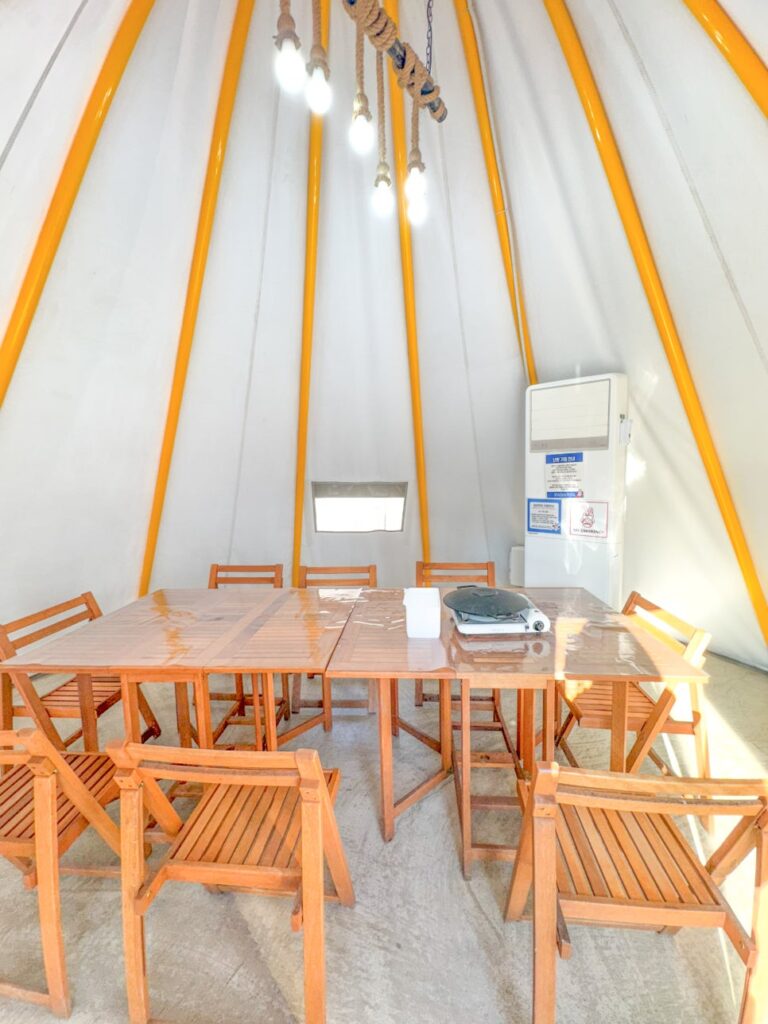 Inside a heated tent