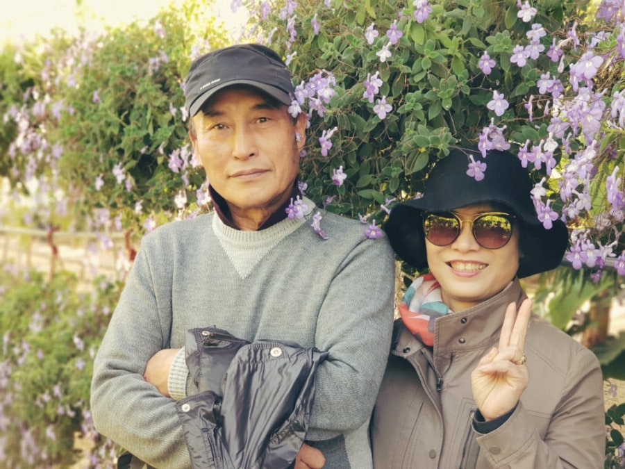 Parents among the flowers