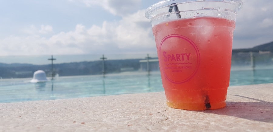 Welcome drink at the Kensington Hotel Jeju rooftop pool