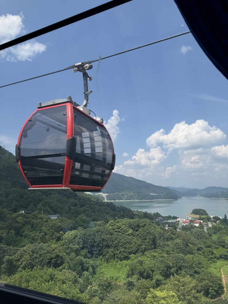 Cheongpung cable car cabins and mountain ridges